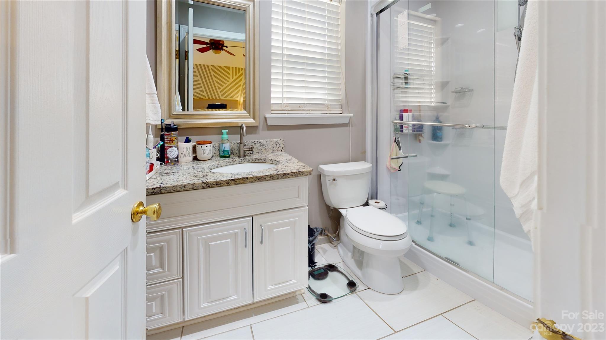 1007 Great Falls Drive Monroe, NC 28110 - Photo 33 of 45 a bathroom with a sink toilet and shower