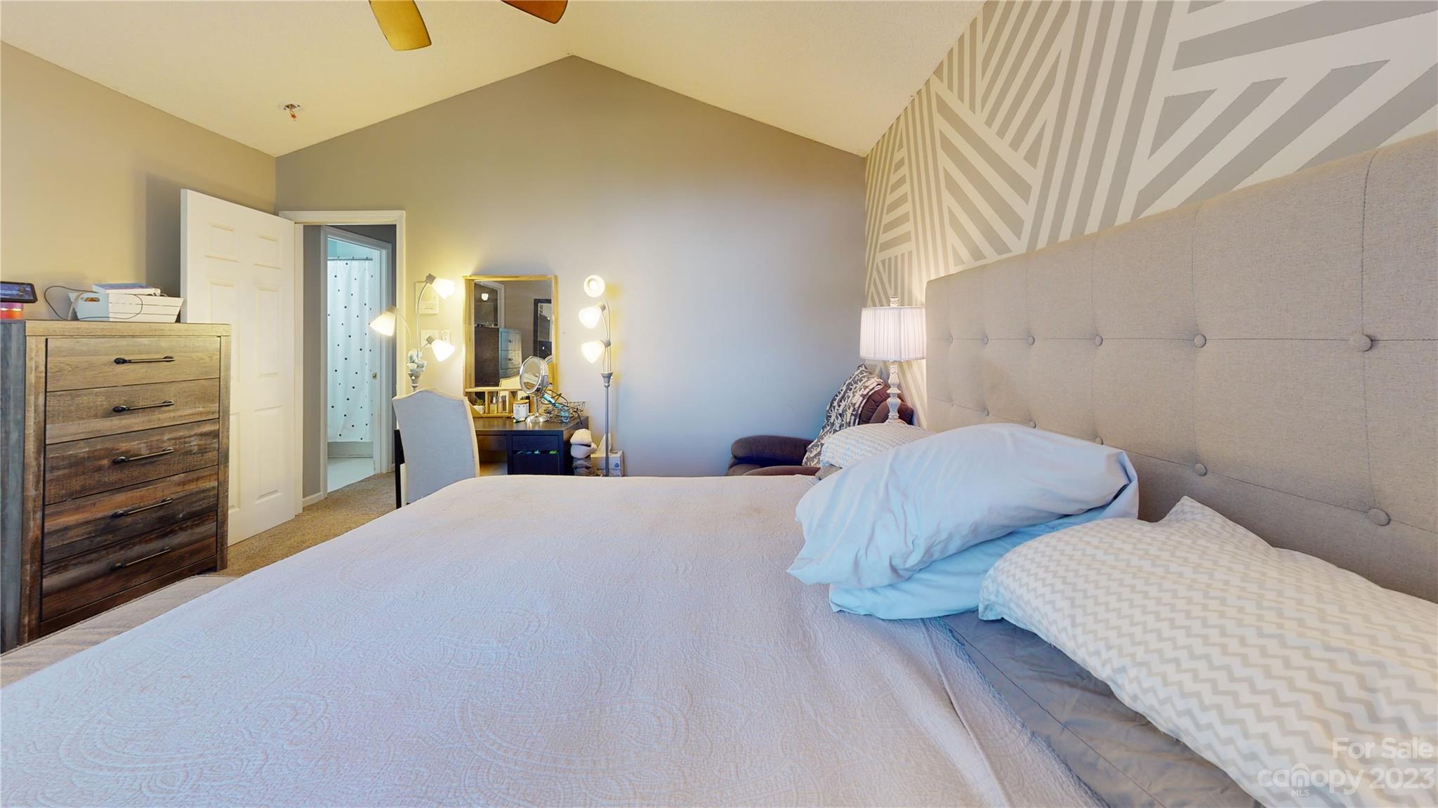 1007 Great Falls Drive Monroe, NC 28110 - Photo 34 of 45 a bedroom with a bed and dresser