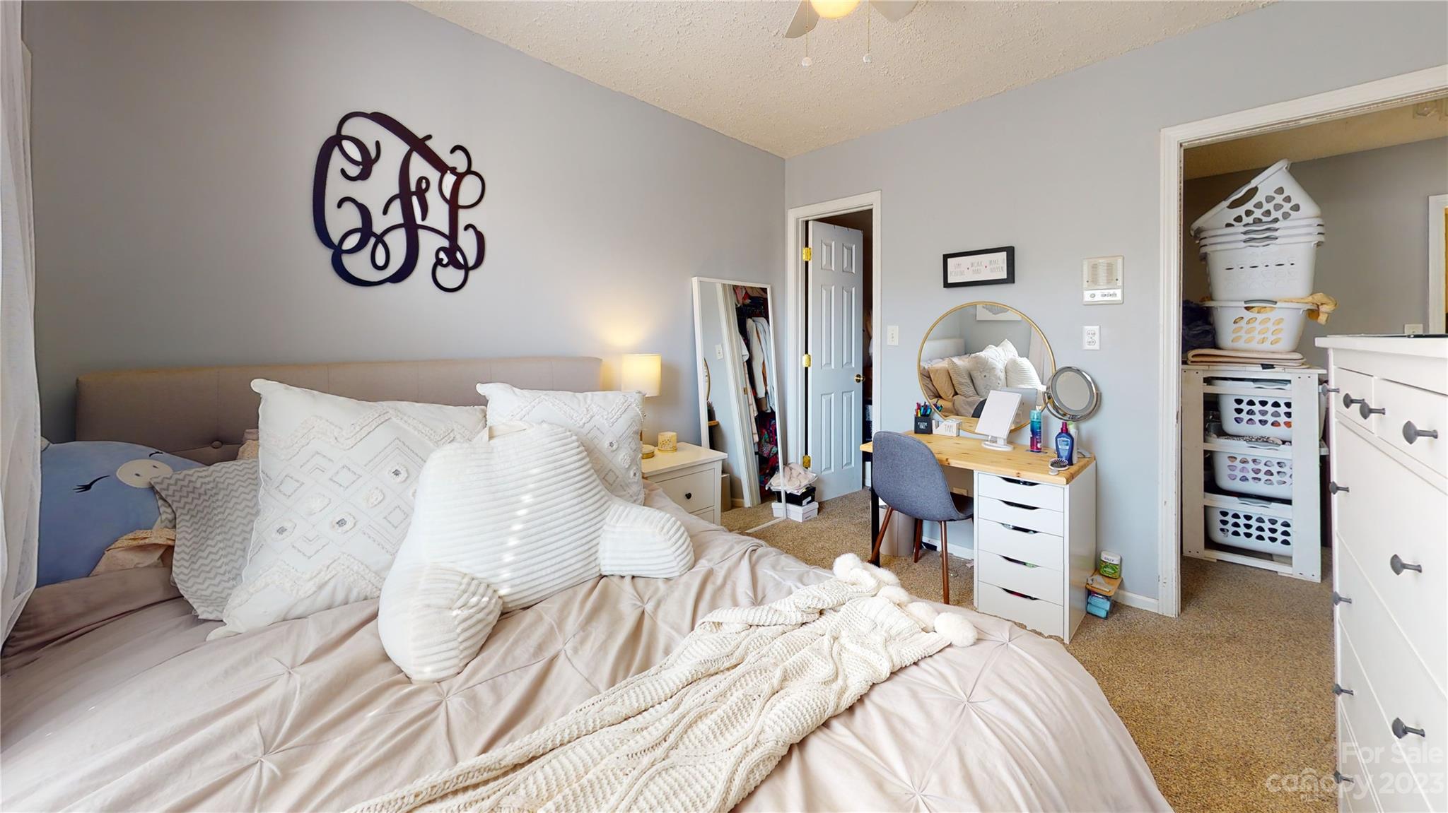 1007 Great Falls Drive Monroe, NC 28110 - Photo 36 of 45 a bedroom with a bed and wooden floor