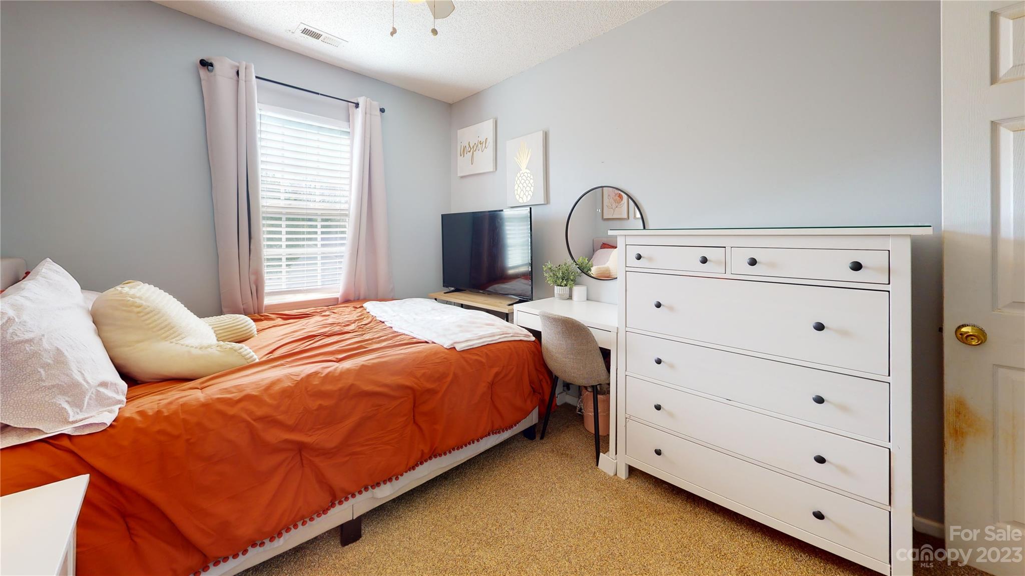 1007 Great Falls Drive Monroe, NC 28110 - Photo 37 of 45 a bedroom with a bed and a window
