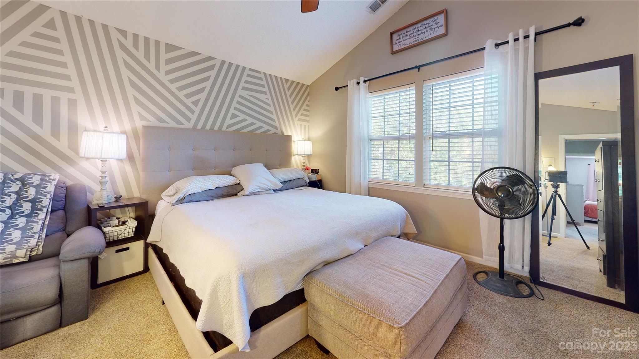 1007 Great Falls Drive Monroe, NC 28110 - Photo 38 of 45 a bedroom with a bed a mirror and a window