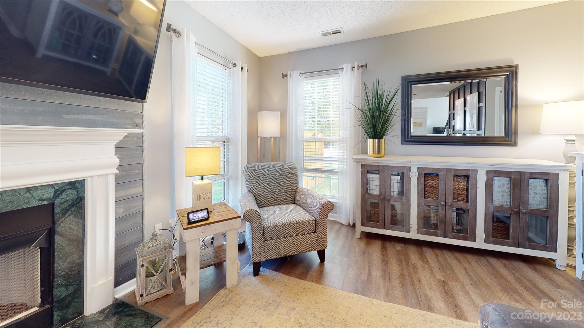 1007 Great Falls Drive Monroe, NC 28110 - Photo 39 of 45 a living room with furniture and a fireplace