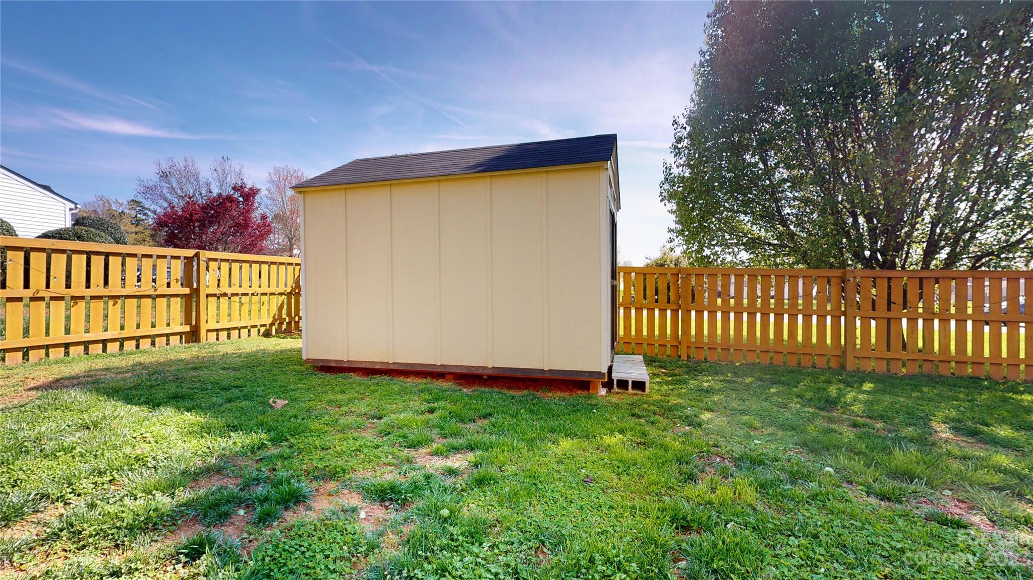1007 Great Falls Drive Monroe, NC 28110 - Photo 43 of 45 a view of a backyard with a garden