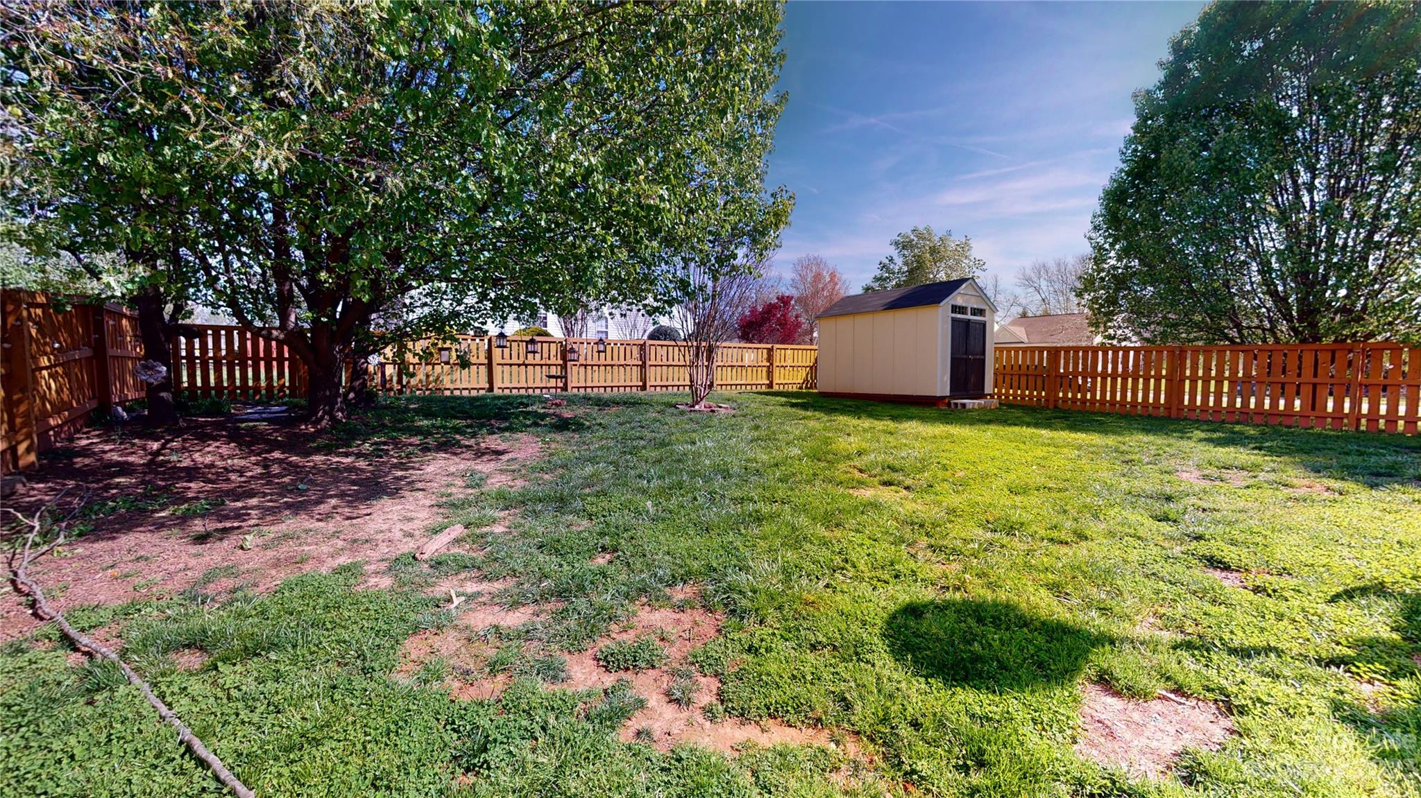 1007 Great Falls Drive Monroe, NC 28110 - Photo 45 of 45 a view of a backyard with a small cabin