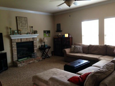 4621 Hermosa Road Crestview, FL 32539 - Photo 7 of 24 a living room with furniture and a fireplace