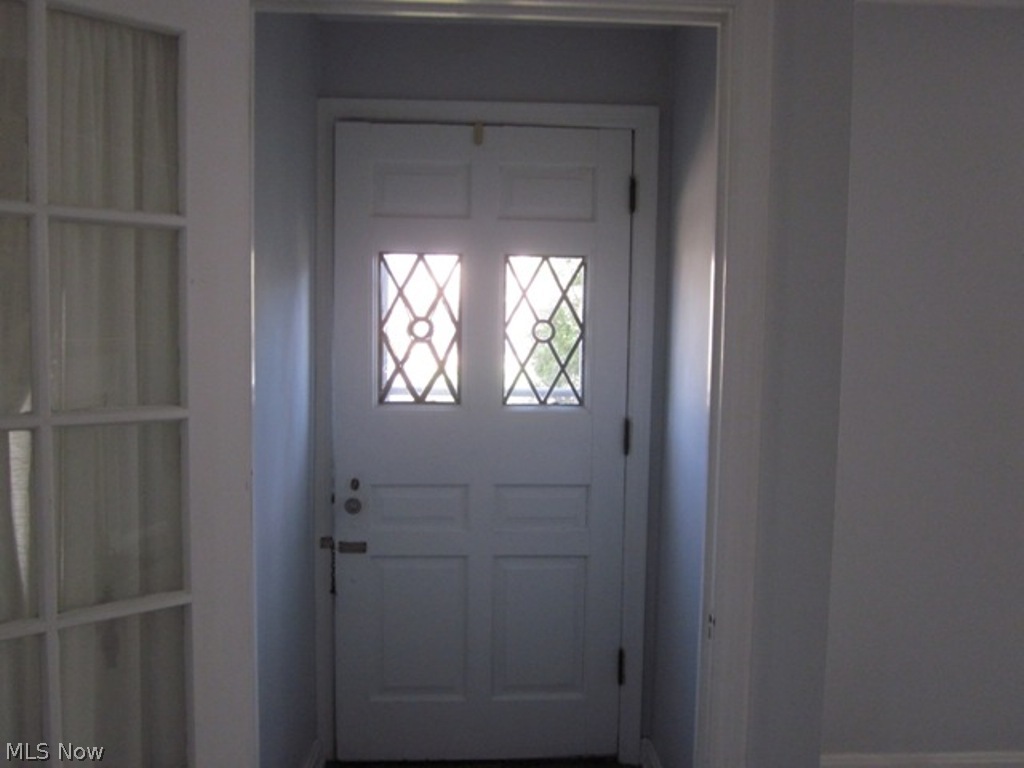 2390 Queenston Road Cleveland, OH 44118 - Photo 2 of 17 Front Door with Beautiful Lead Windows.