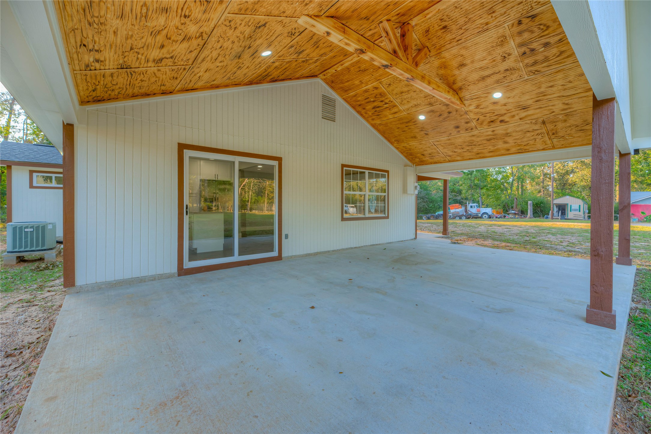 388 Sunrise Wood Road Goodrich, TX 77335 - Photo 18 of 33 a view of an empty room with a porch