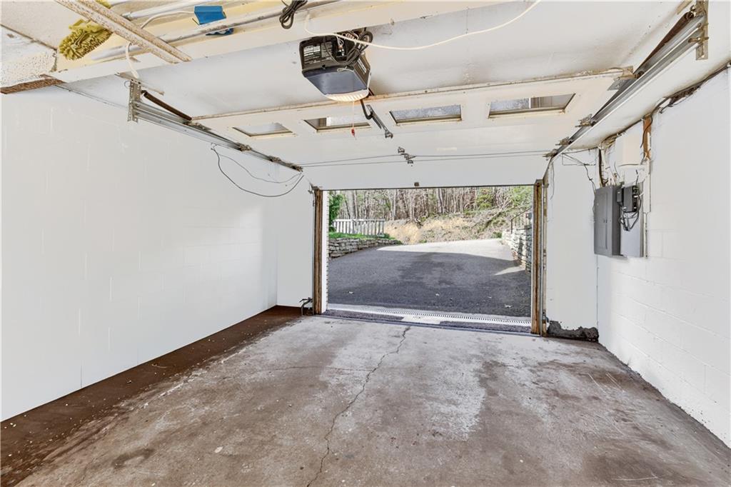 7177 Shannon Road Verona, PA 15147 - Photo 36 of 49 Garage, integral drive through garage, great access for back yard