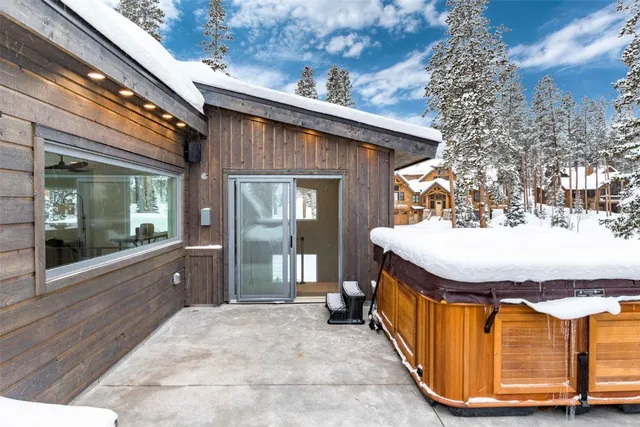 a spacious bathroom with a sink mirror and bathtub