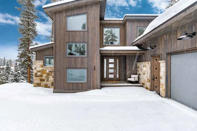 a front view of a house with a outdoor space