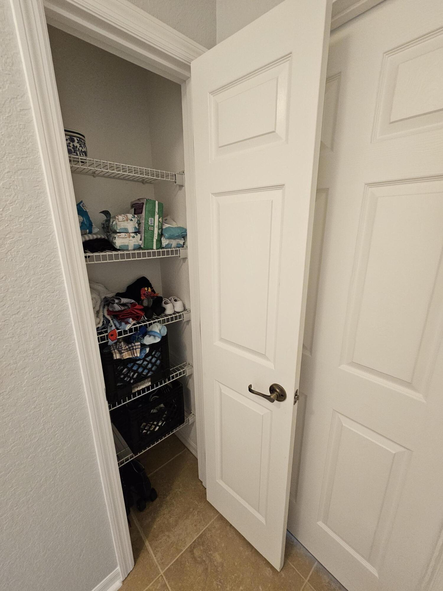 6608 Southwest 143rd Ln Road Ocala, FL 34473 - Photo 20 of 39 R hall closet