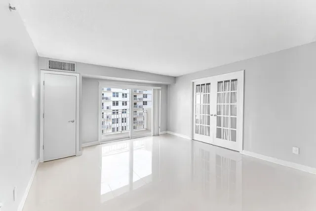 a picture of a bathroom with a shower
