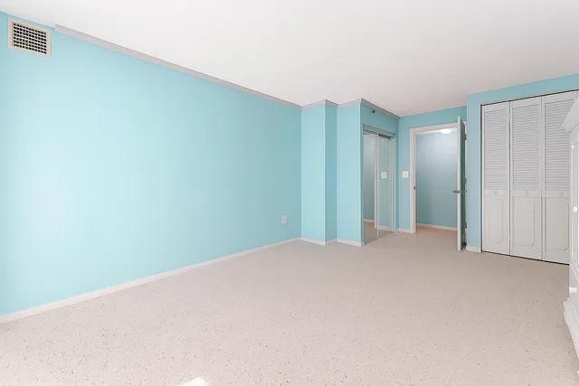 a building with glass door and glass windows