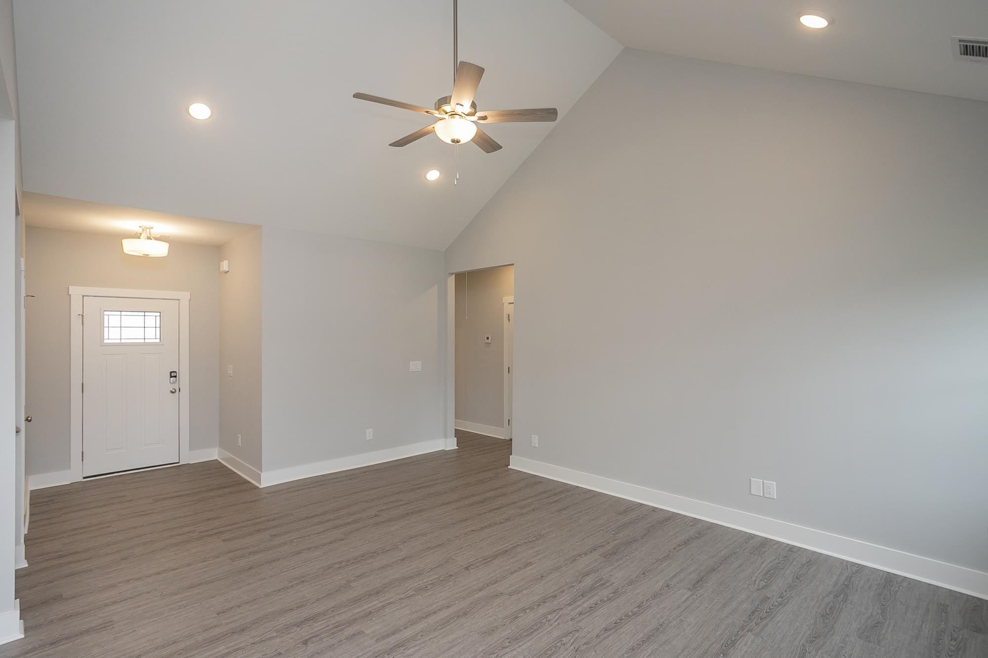302 Fieldstone Lane Springfield, TN 37172 - Photo 8 of 58 a view of an empty room with wooden floor