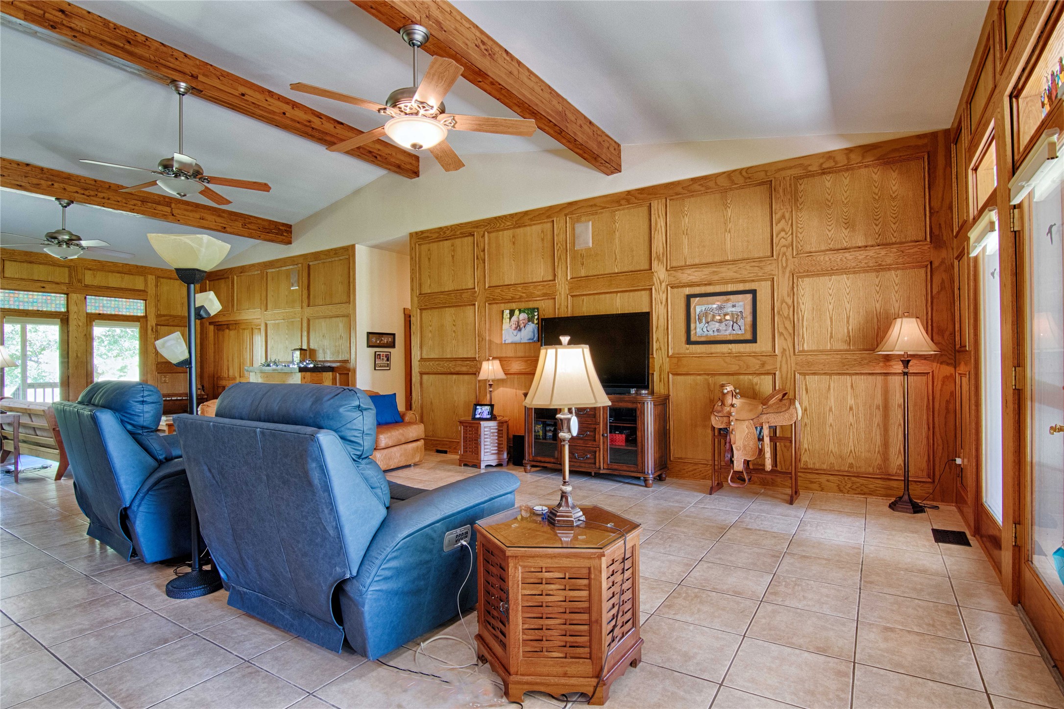 7755 Fm 1295 Moulton, TX 77975 - Photo 11 of 39 a living room with furniture a flat screen tv and large window