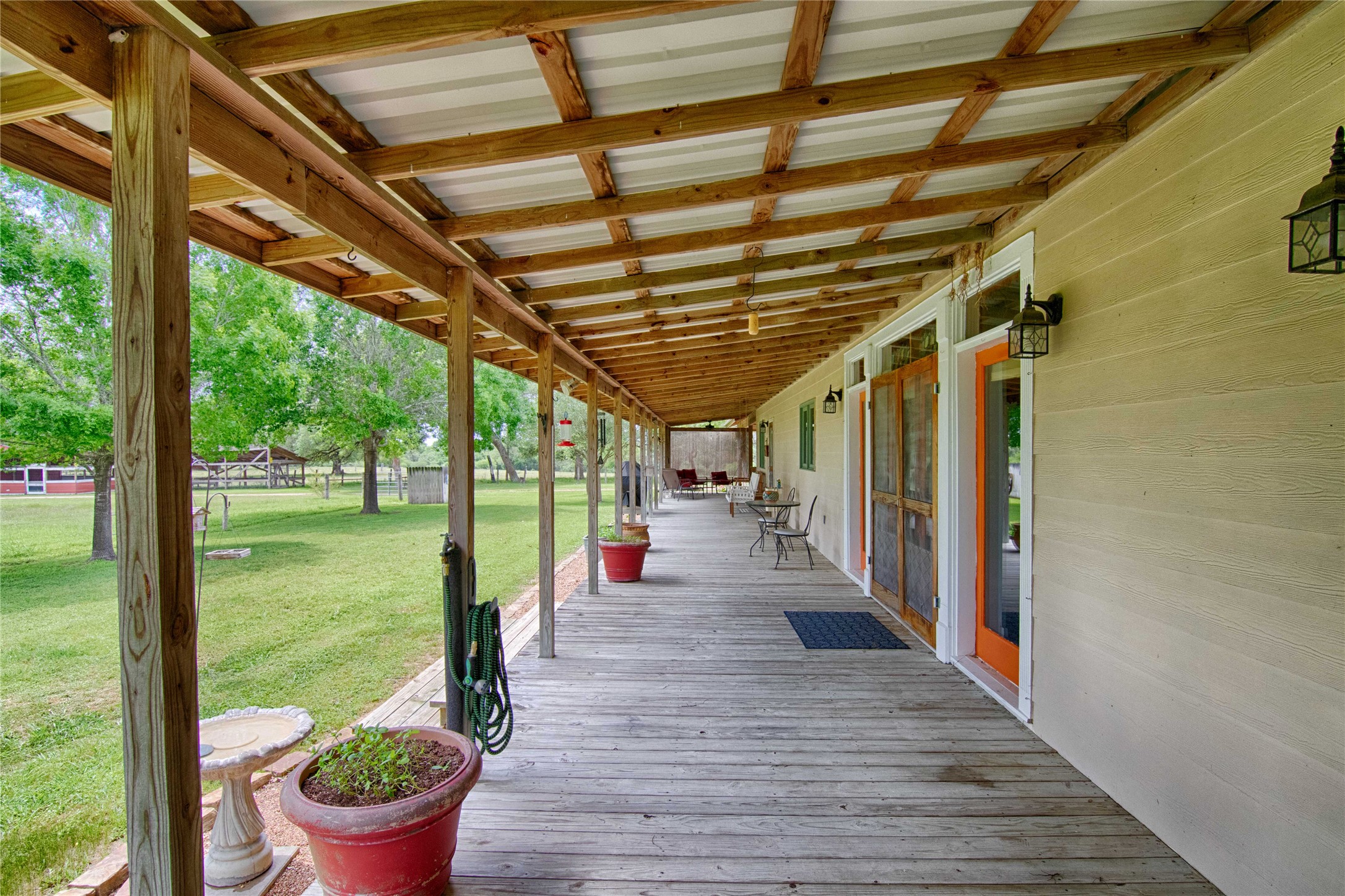 7755 Fm 1295 Moulton, TX 77975 - Photo 25 of 39 a view of a porch with wooden floor