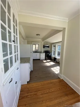 a view of living room with furniture and flat screen tv