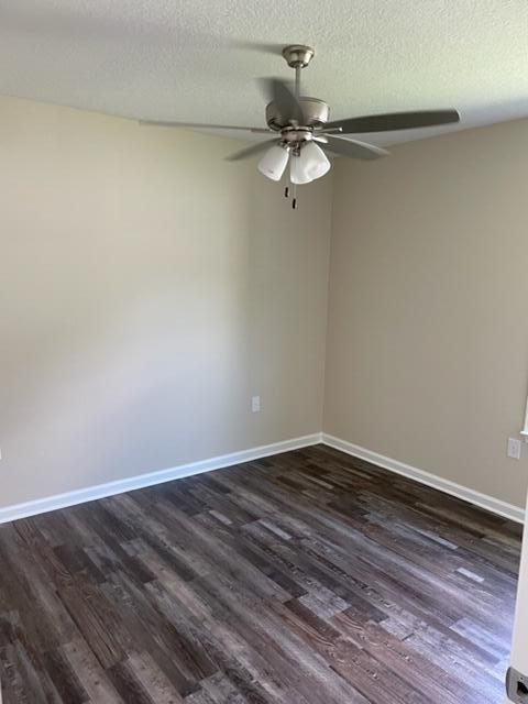 952 Mapoles Street Crestview, FL 32536 - Photo 19 of 23 a view of a room with wooden floor