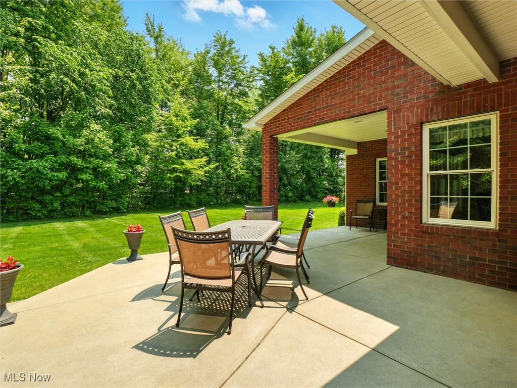 4440 Rutledge Avenue Ashtabula, OH 44004 - Photo 39 of 50 View of patio / terrace featuring outdoor dining area