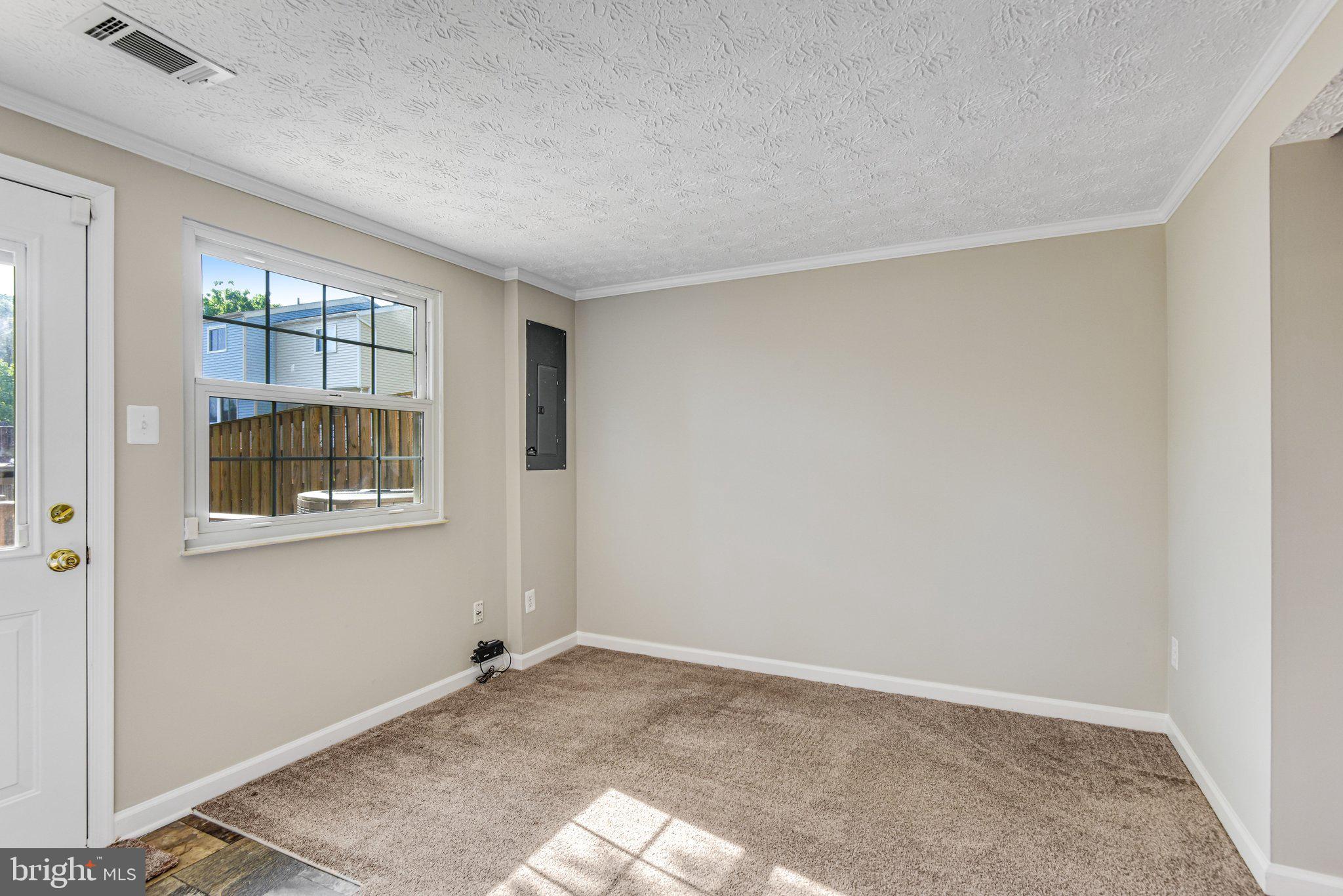 8339 Bark Tree Court Springfield, VA 22153 - Photo 12 of 23 a view of an empty room with a window