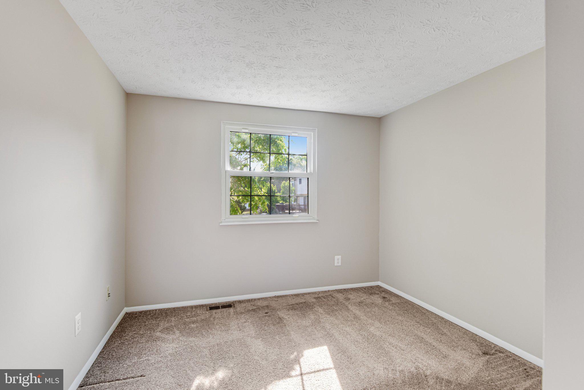 8339 Bark Tree Court Springfield, VA 22153 - Photo 17 of 23 an empty room with a window