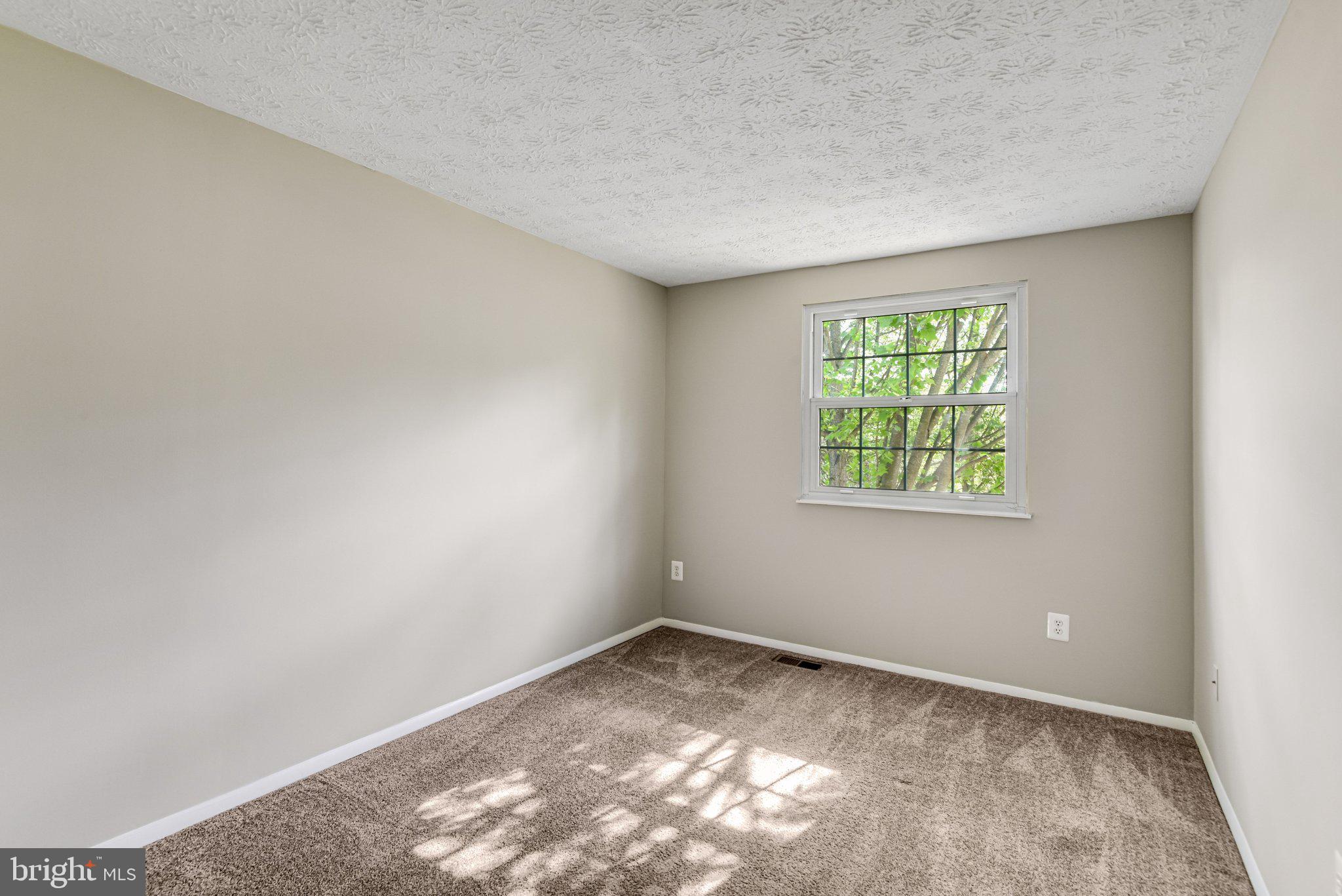 8339 Bark Tree Court Springfield, VA 22153 - Photo 19 of 23 an empty room with a window