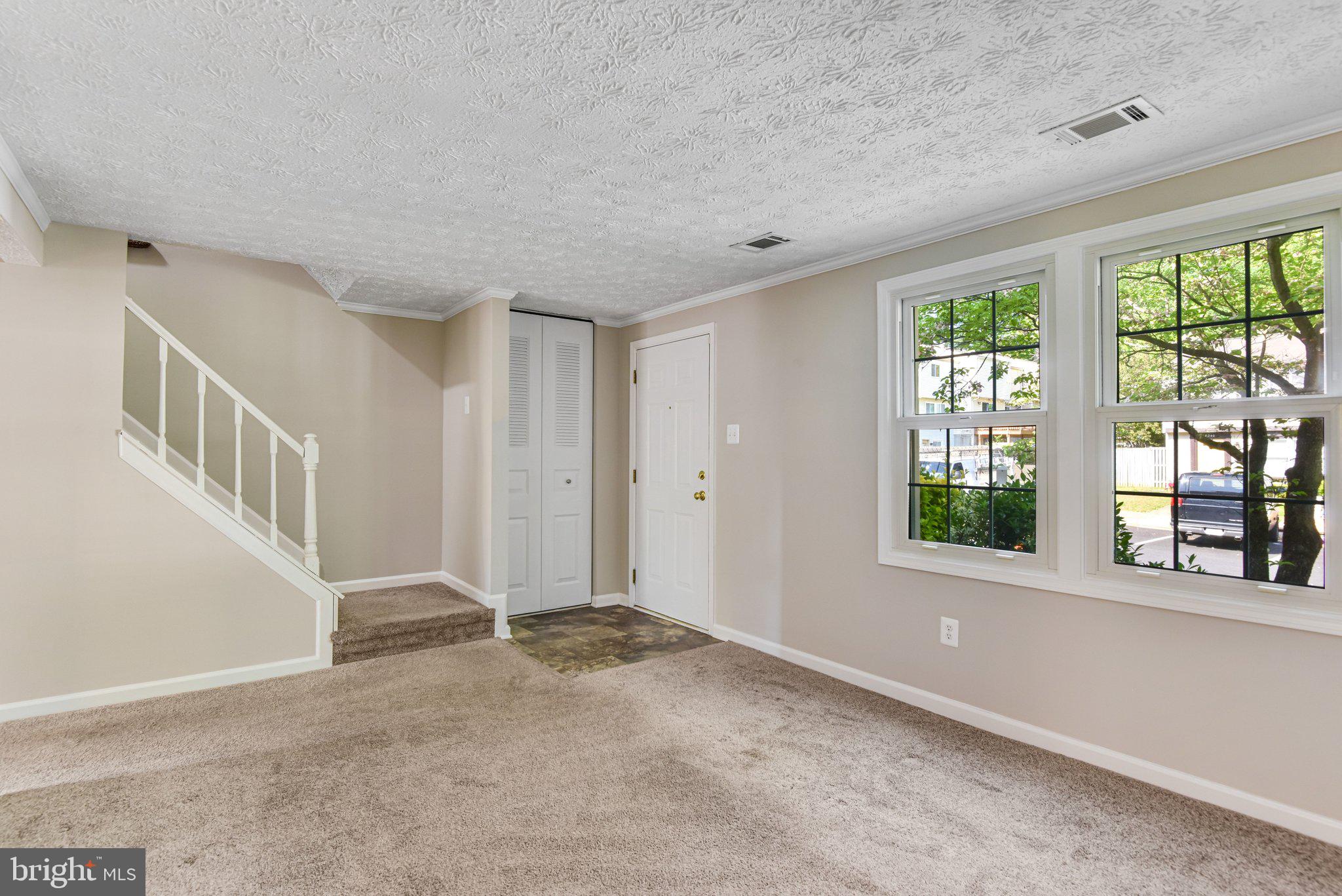 8339 Bark Tree Court Springfield, VA 22153 - Photo 3 of 23 a view of an empty room with a window