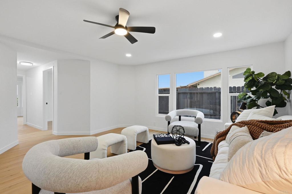 1333 Helix Street Spring Valley, CA 91977 - Photo 21 of 45 a living room with furniture and a large window
