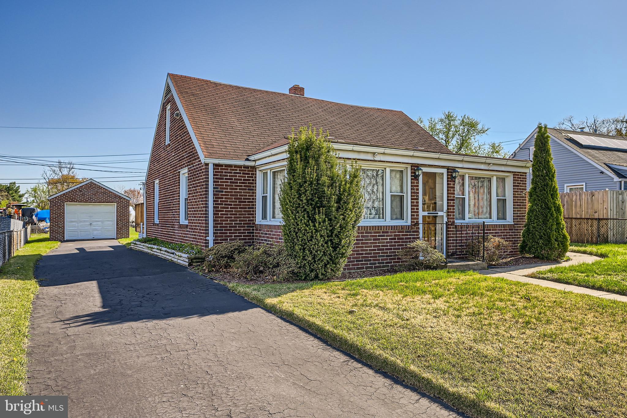 3169 Baybriar Road Baltimore, MD 21222 - Photo 1 of 28 a front view of a house with garden
