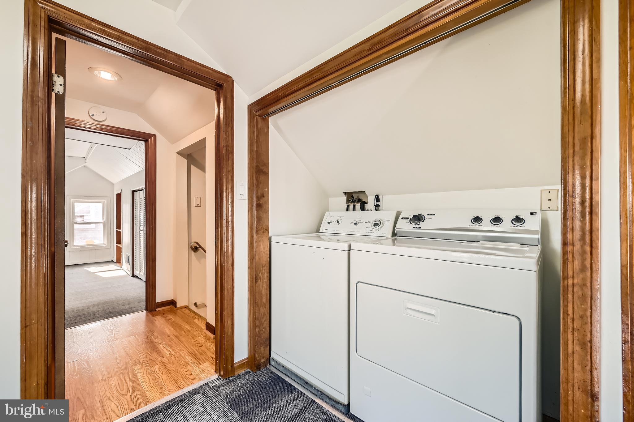 3169 Baybriar Road Baltimore, MD 21222 - Photo 21 of 28 a view of washer and dryer with kitchen view