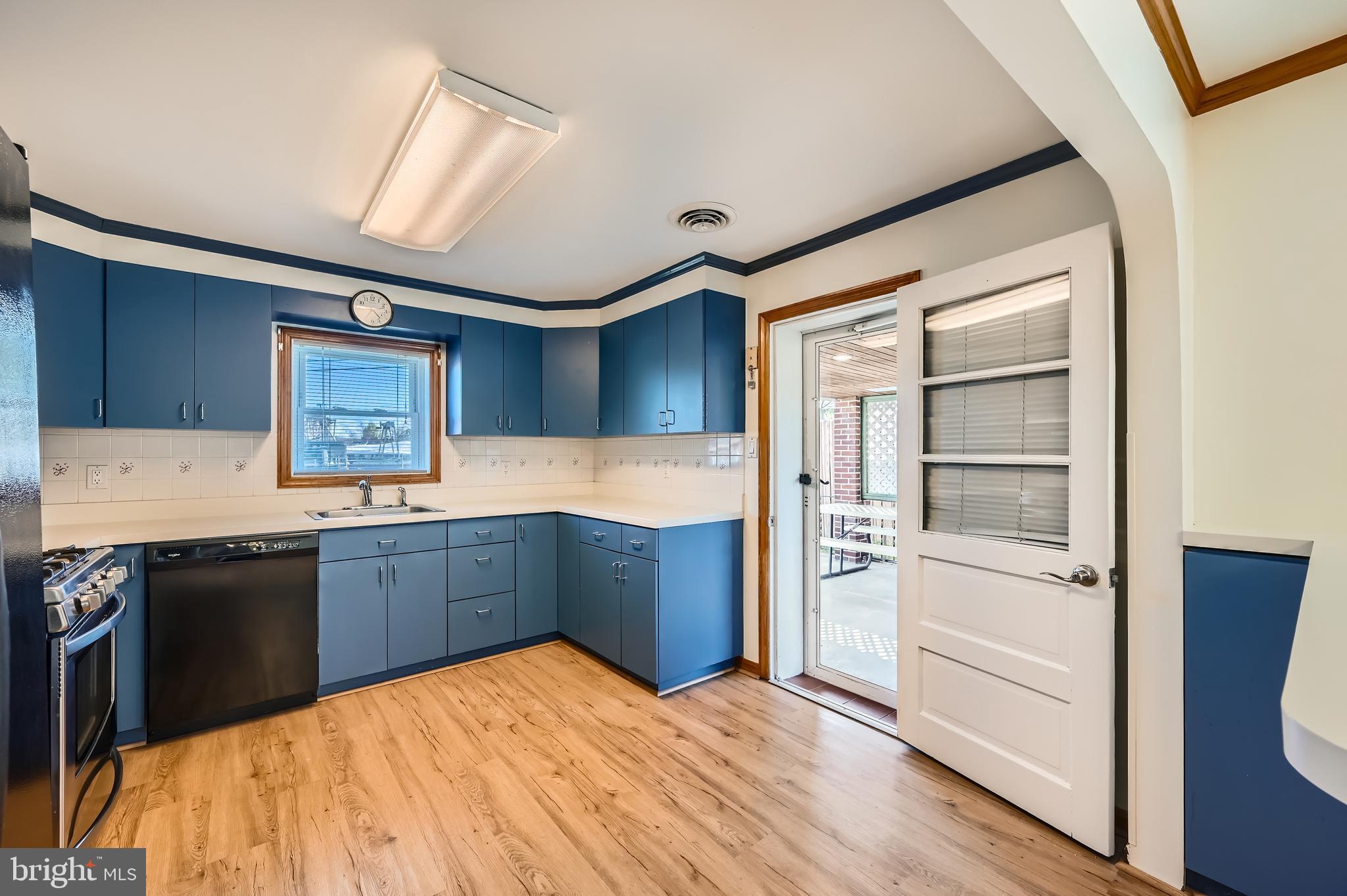3169 Baybriar Road Baltimore, MD 21222 - Photo 8 of 28 a kitchen with stainless steel appliances granite countertop a refrigerator and a stove top oven
