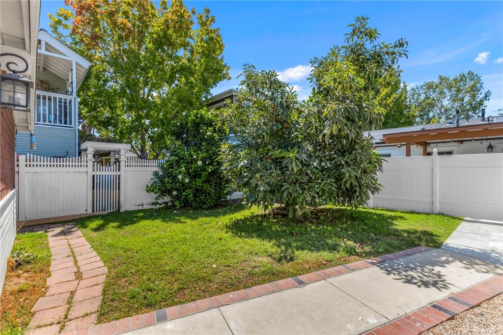 Undisclosed Address Costa Mesa, CA 92627 - Photo 13 of 15 a view of a back yard of the house