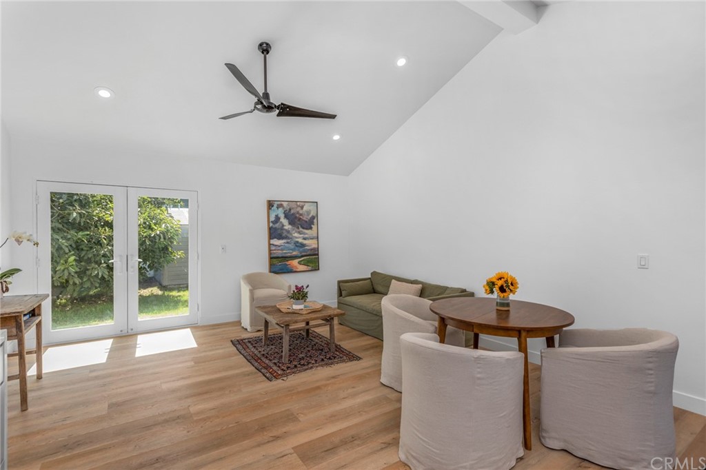 Undisclosed Address Costa Mesa, CA 92627 - Photo 3 of 15 a living room with furniture and a wooden floor