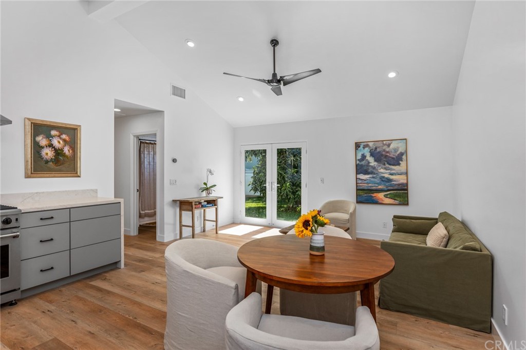 Undisclosed Address Costa Mesa, CA 92627 - Photo 4 of 15 a living room with furniture and wooden floor