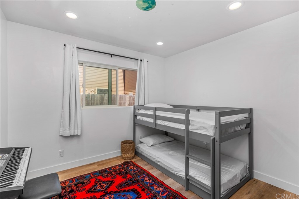 Undisclosed Address Costa Mesa, CA 92627 - Photo 10 of 15 a bedroom with a bed and a window