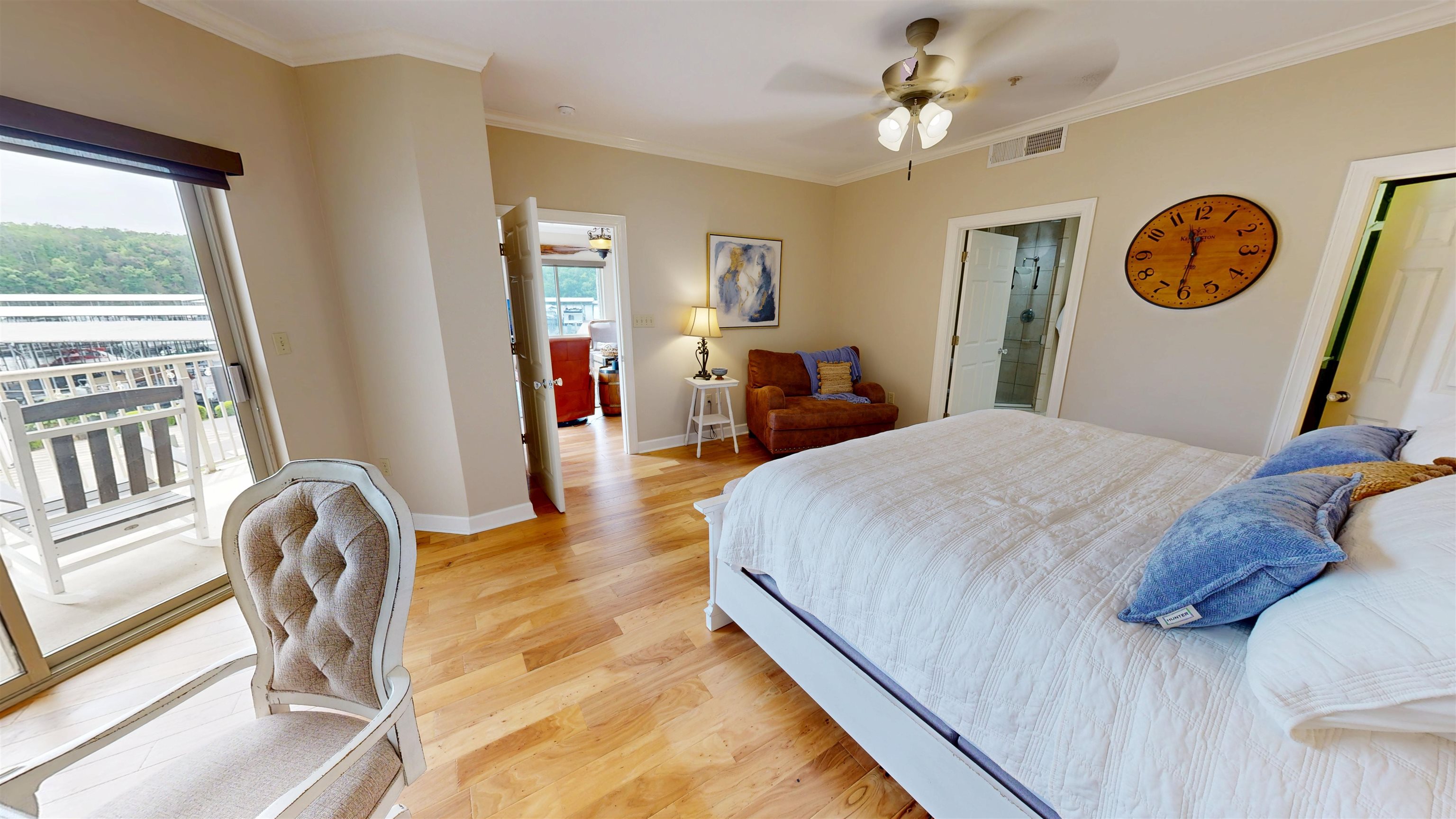 325 Cr 380 L-103 Road, Unit L103 Iuka, MS 38852 - Photo 20 of 40 Bedroom featuring wood-finish flooring, a ceiling fan with integrated lighting, and crown molding