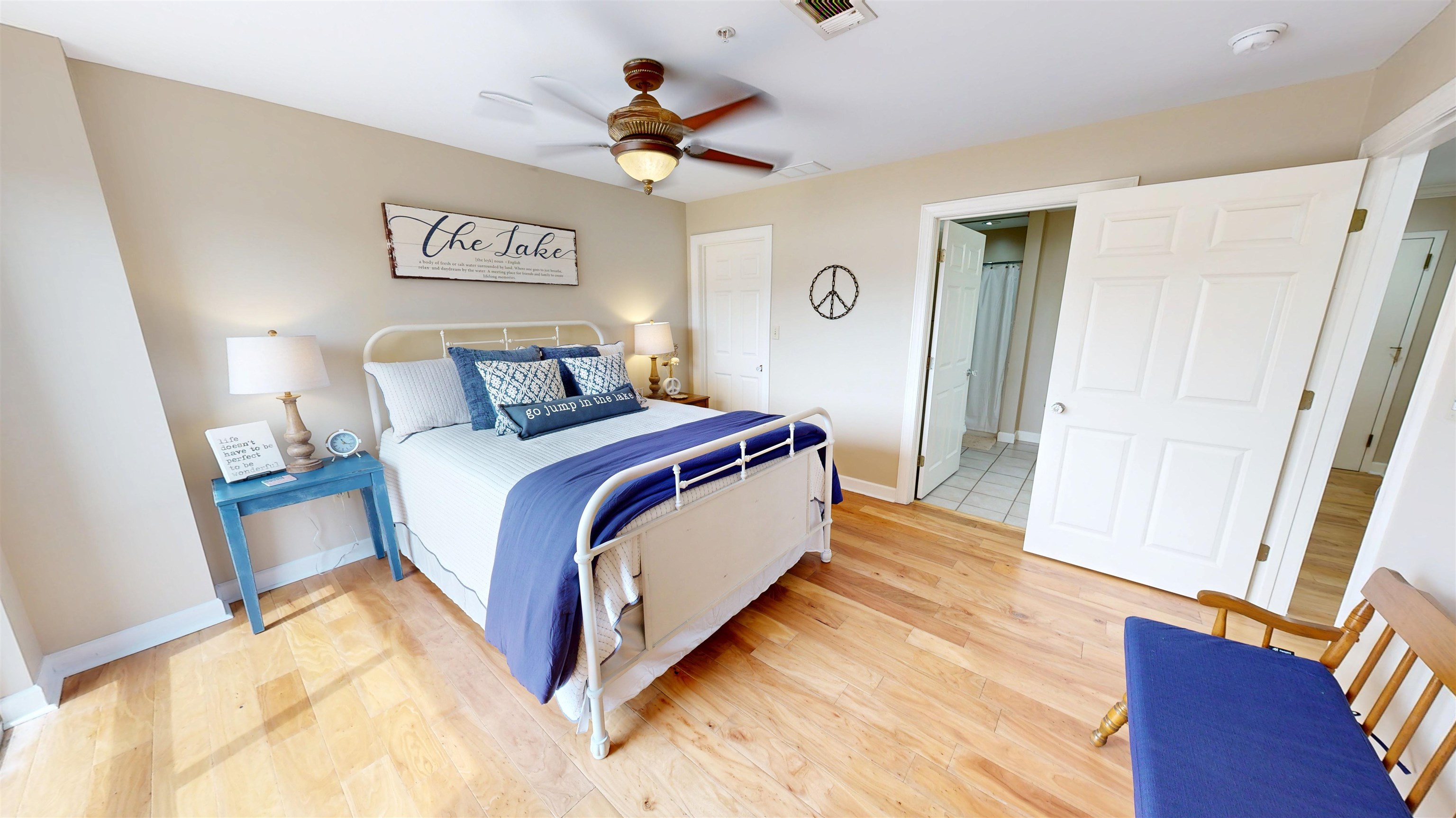 325 Cr 380 L-103 Road, Unit L103 Iuka, MS 38852 - Photo 25 of 40 Spacious bedroom featuring wood-finish flooring and neutral wall tones
