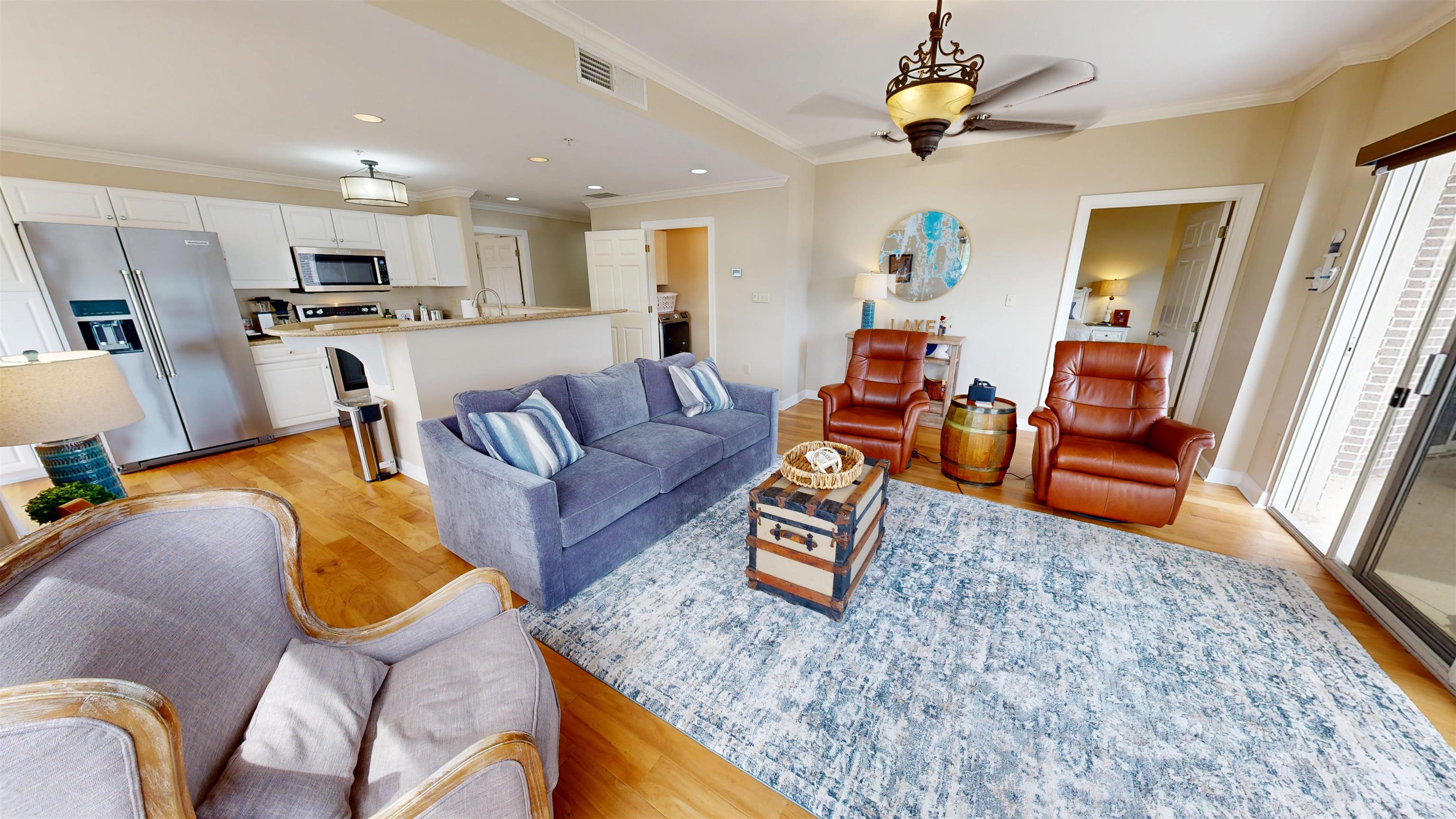 325 Cr 380 L-103 Road, Unit L103 Iuka, MS 38852 - Photo 10 of 40 Open-concept living area with wood-finish flooring
