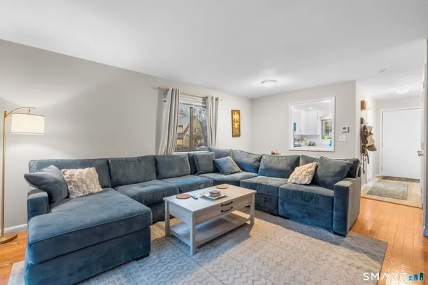 a living room with furniture and a couch