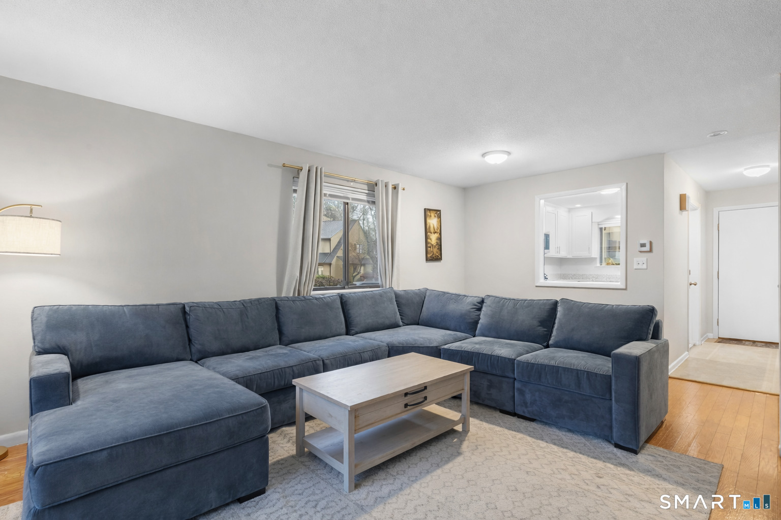 9 Avon Court, Unit 9 Beacon Falls, CT 06403 - Photo 5 of 11 a living room with furniture and a couch