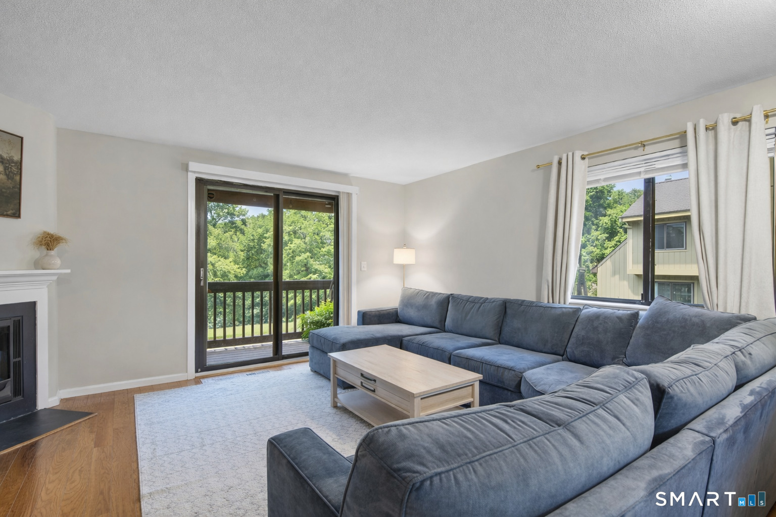 9 Avon Court, Unit 9 Beacon Falls, CT 06403 - Photo 6 of 11 a living room with furniture and a couch
