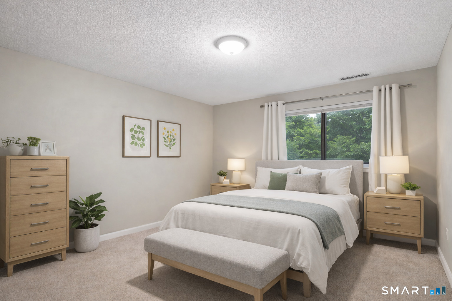 9 Avon Court, Unit 9 Beacon Falls, CT 06403 - Photo 7 of 11 a bedroom with a bed and a closet