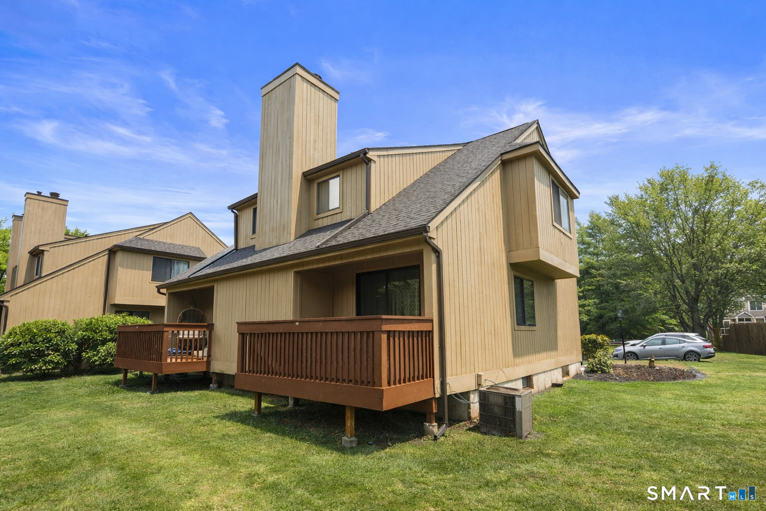 9 Avon Court, Unit 9 Beacon Falls, CT 06403 - Photo 10 of 11 a view of a house with a yard