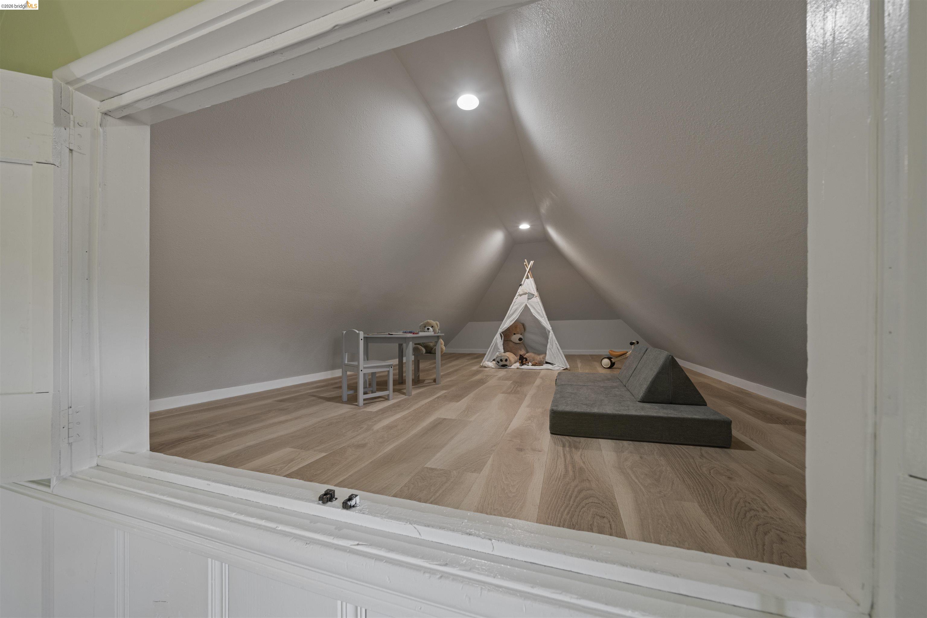 1170 Sterling Avenue Berkeley, CA 94708 - Photo 33 of 52 Playroom featuring light wood finished floors and vaulted ceiling