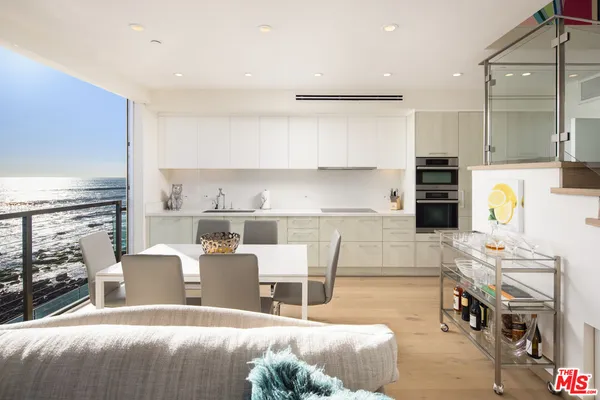 a bathroom with a double vanity sink mirror and double