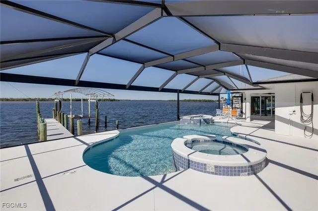 a view of a swimming pool with a patio