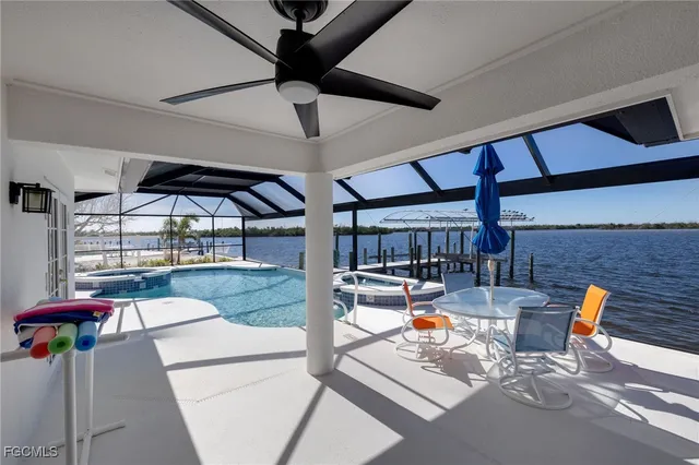 a view of gym with a table and chairs