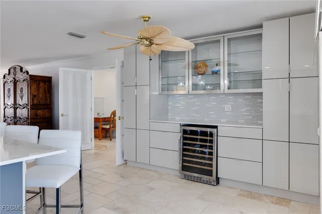 a view of kitchen with furniture and cabinets