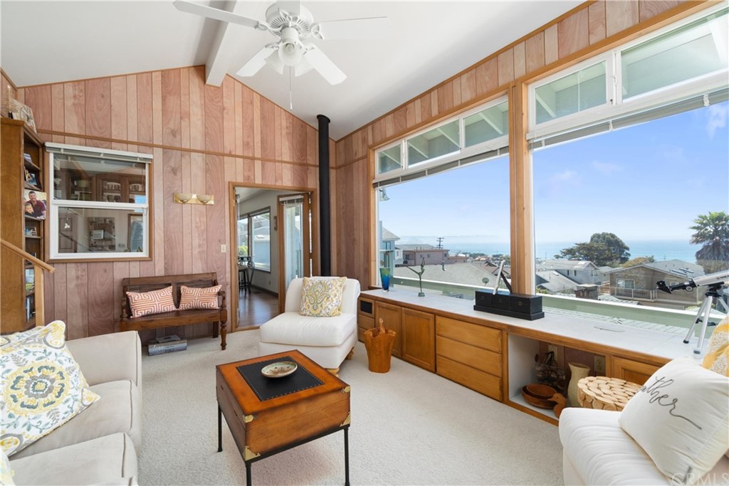 188 8th Street Cayucos, CA 93430 - Photo 12 of 33 a living room with furniture and a large window