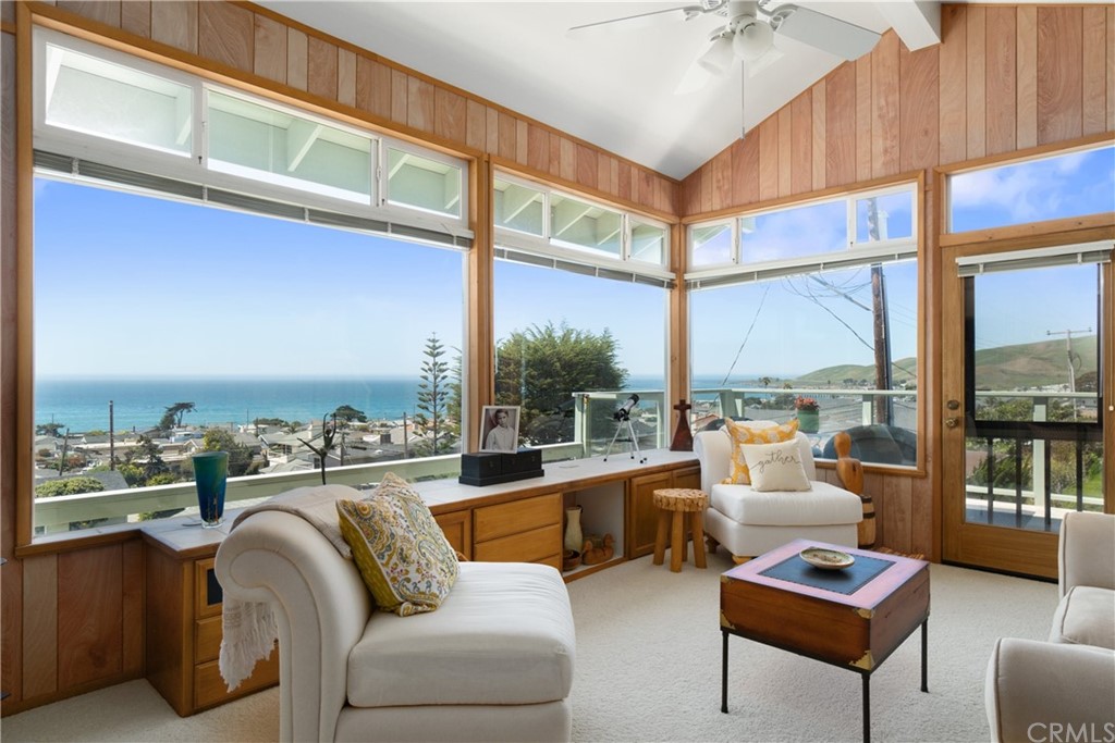 188 8th Street Cayucos, CA 93430 - Photo 14 of 33 a living room with furniture a large window and a table
